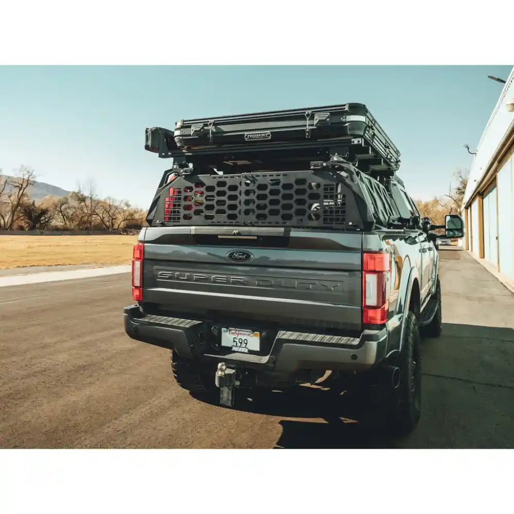 Rear view of pickup truck with GateKEEPER tailgate security gate installed