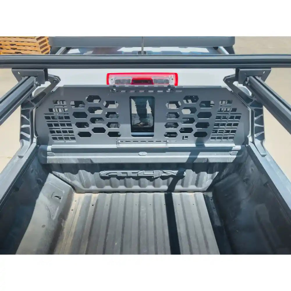Rear view of pickup truck with HeadBANGER cab guard
