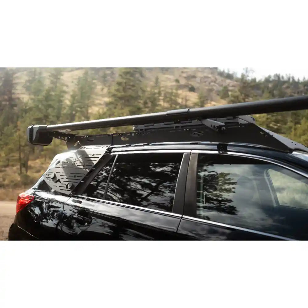 Rear window panel installed on Subaru Outback with roof rack