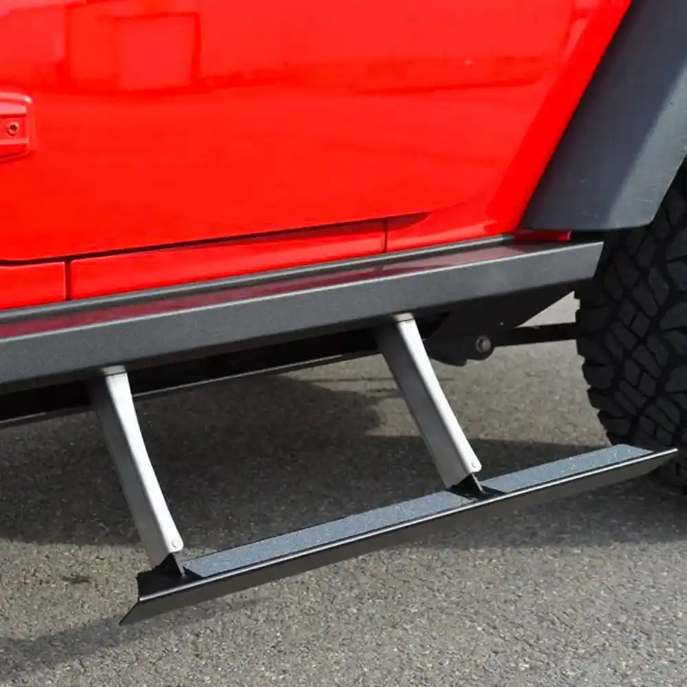 Red Jeep Wrangler JK with Rock Slide Engineering door step slider mounted on rocker panel