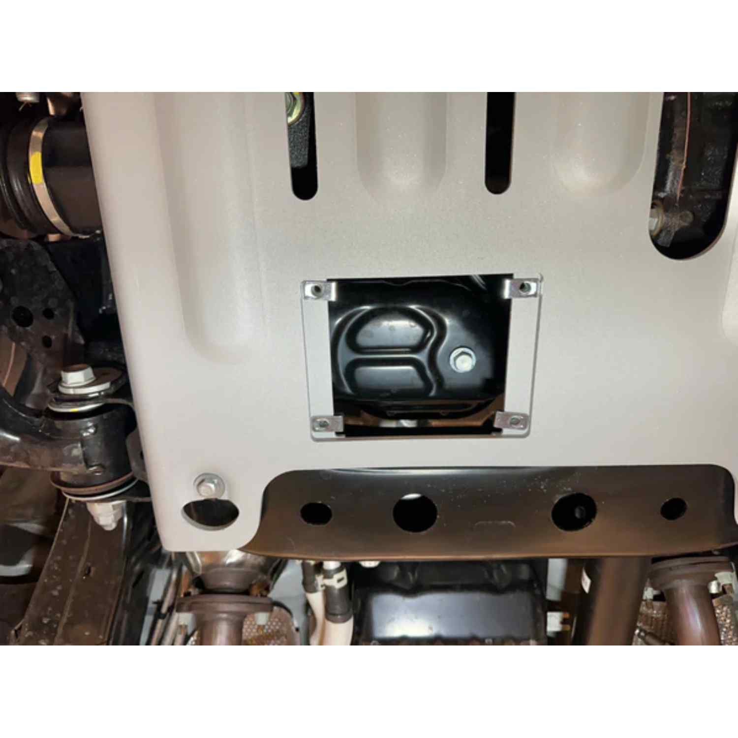 hatch open view of the skid plate