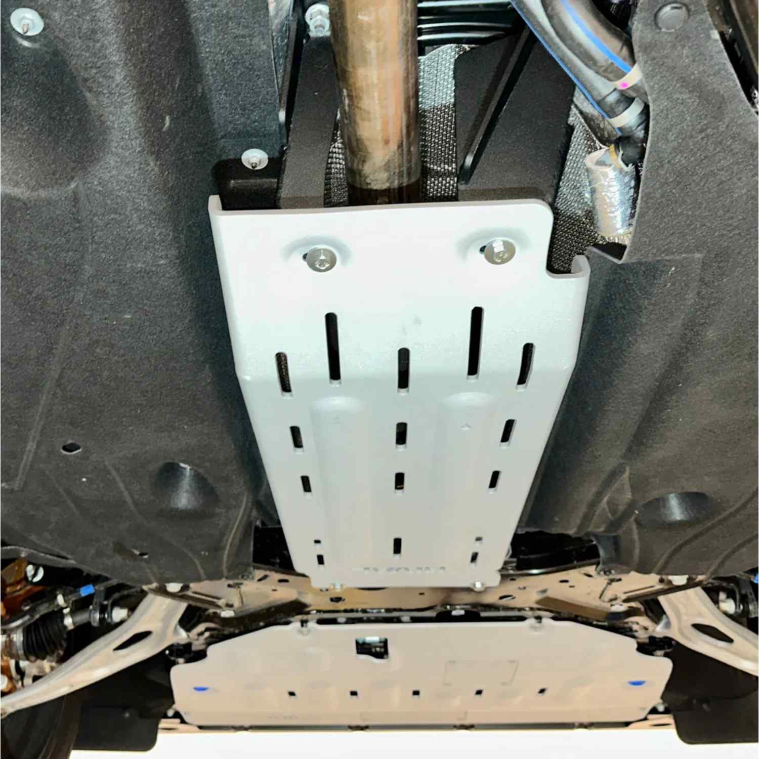 mounted catalytic skid plate for Maverick Hybrid