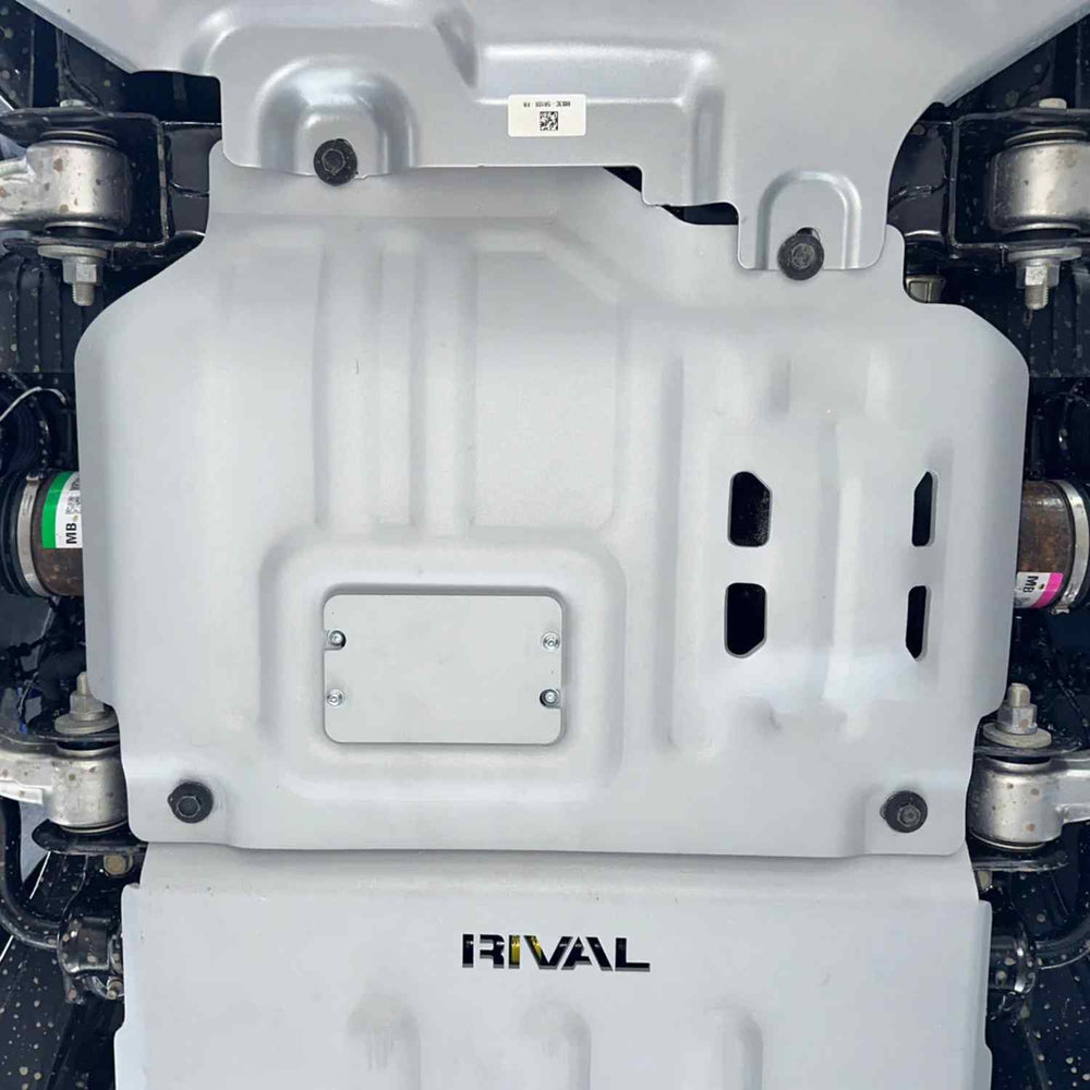 Close-up view of the mounted engine skid plate on Raptor