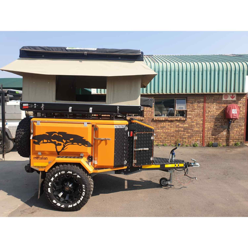 Side View Of Bundutec RTT Mounted On Yellow Trailer