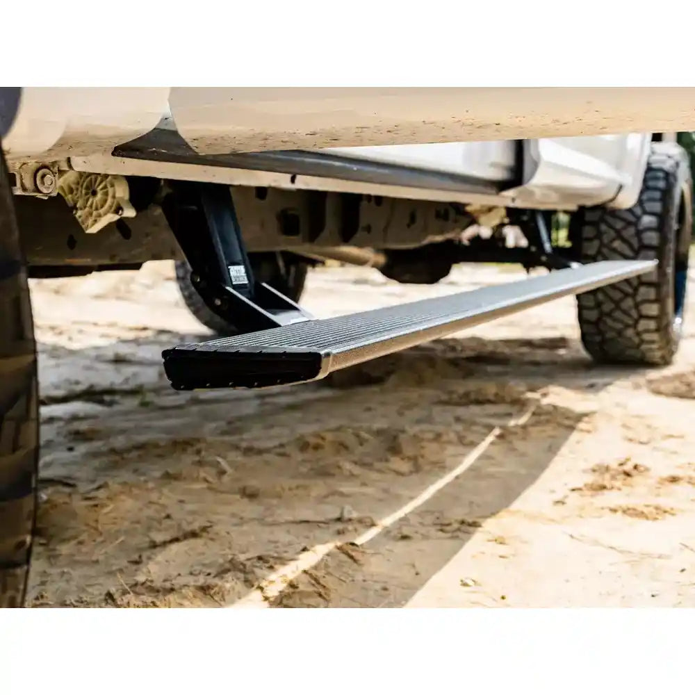 Side step of a vehicle on a dirt road
