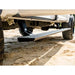 Side step of a vehicle on a dirt road
