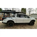 Side view of the Honda Ridgeline with mounted Shiprock and closed roof top tent on top.