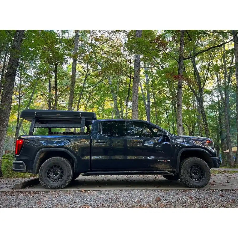 Close-up of the TUWA Pro rack installed on a GMC Sierra AT4X AEV
