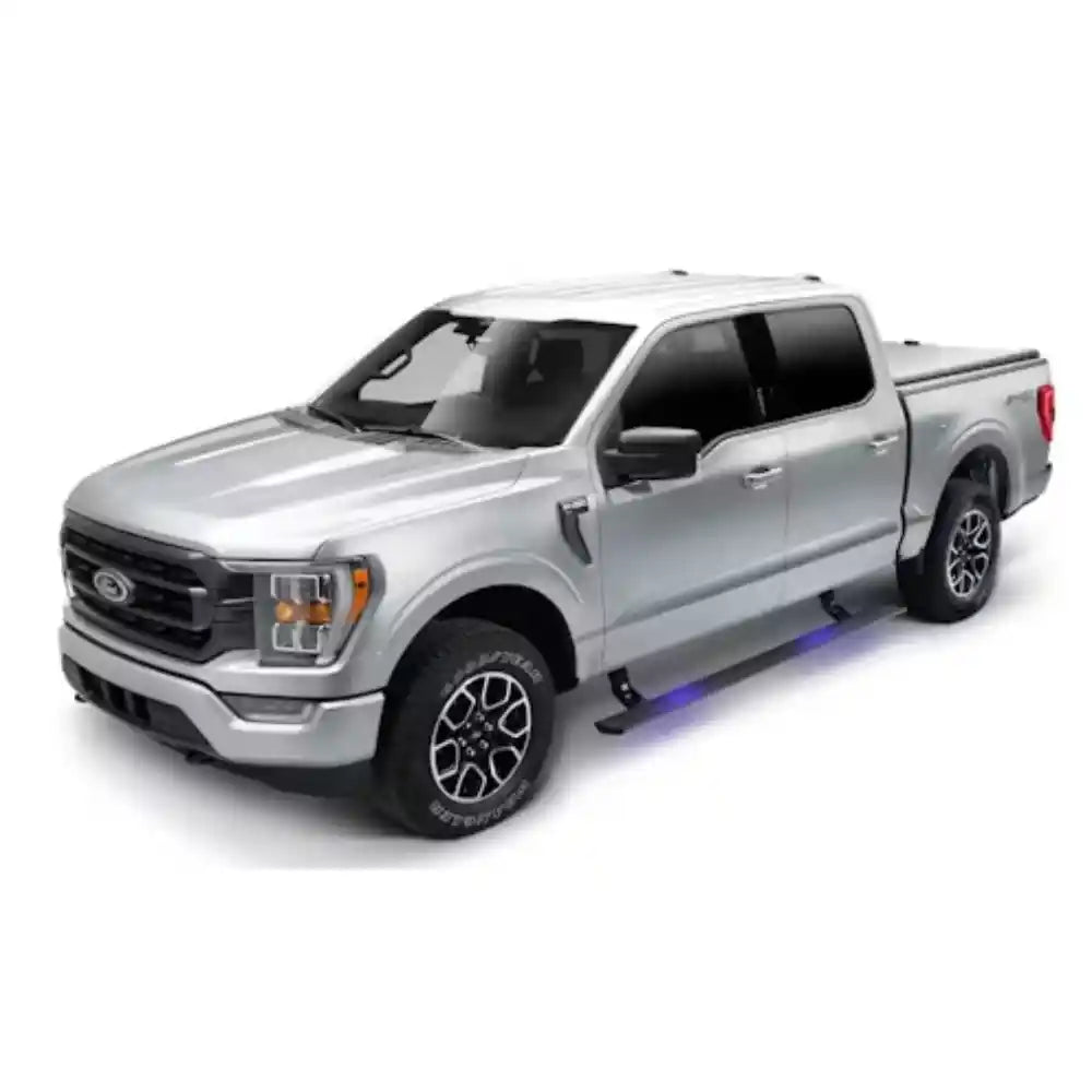 Silver 2021-2023 Ford F-150 equipped with AMP Research PowerStep running boards