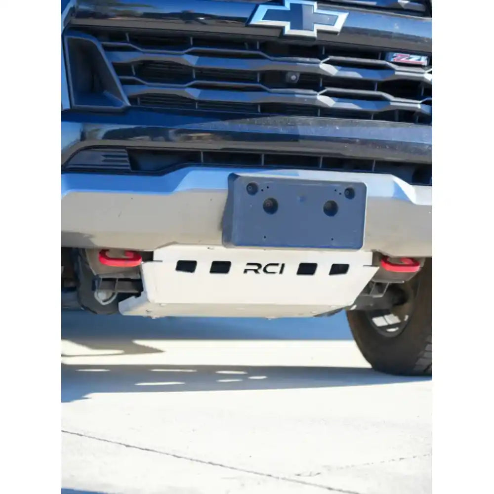 Silver RCI skid plate bolted under 2015+ Colorado frame