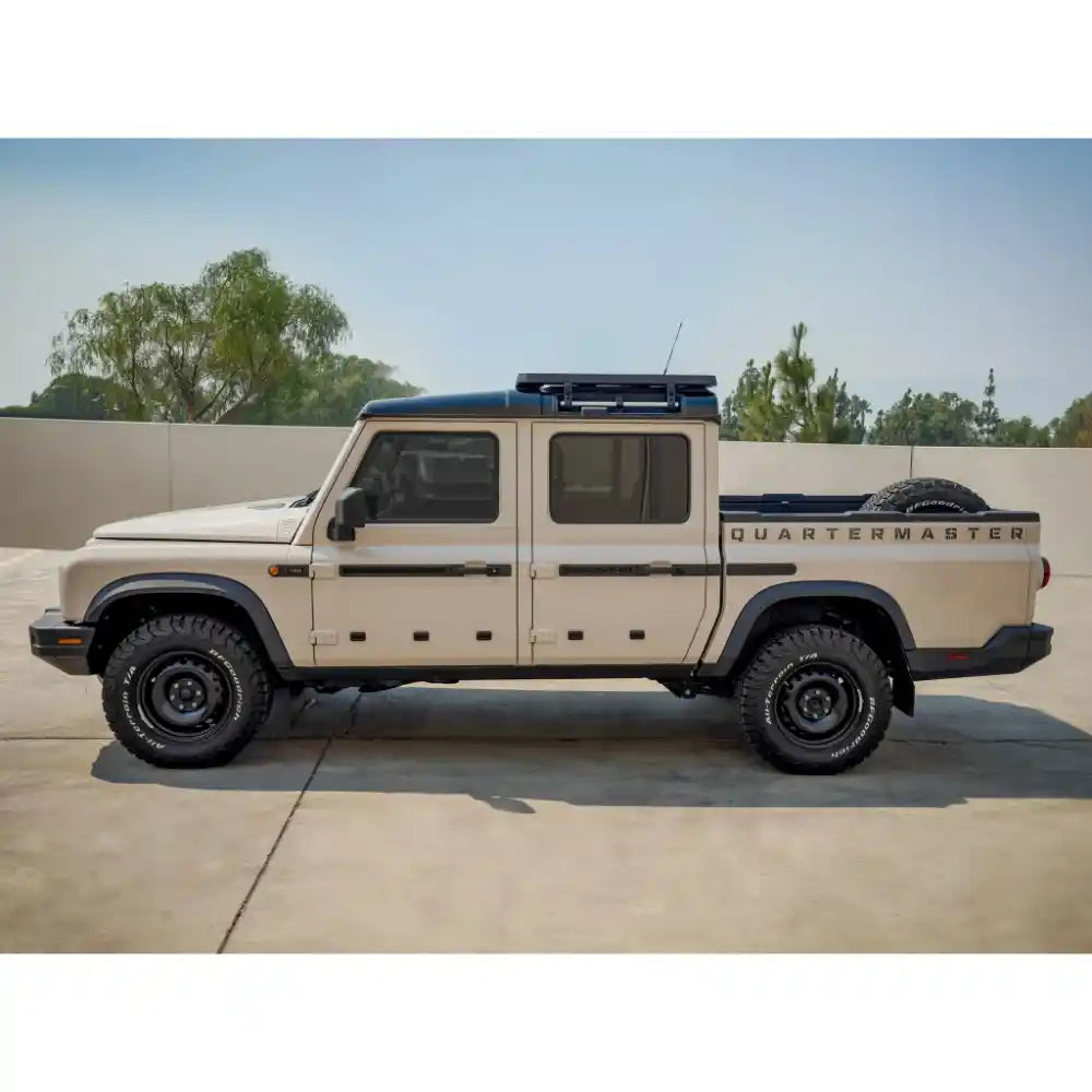 Three-quarter view of automotive roof rack with mounting system