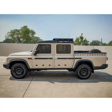 Three-quarter view of automotive roof rack with mounting system