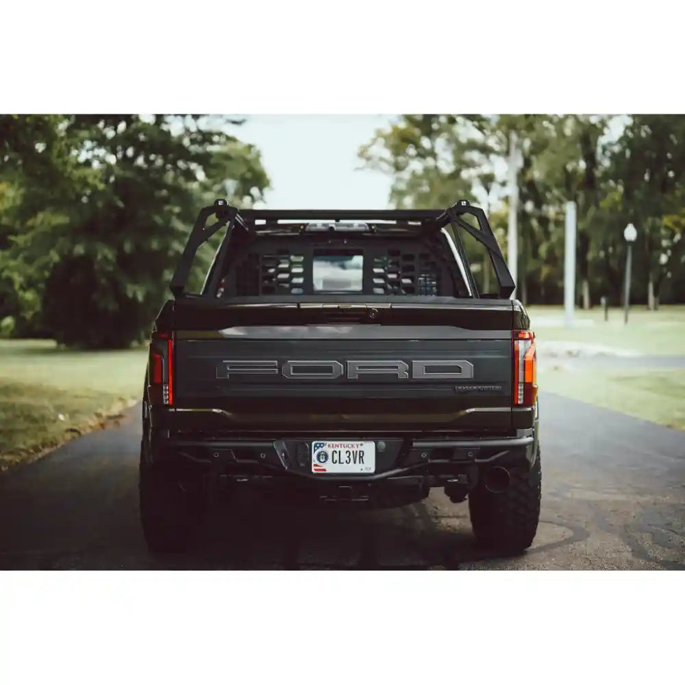 Truck bed cab guard panel protecting rear window