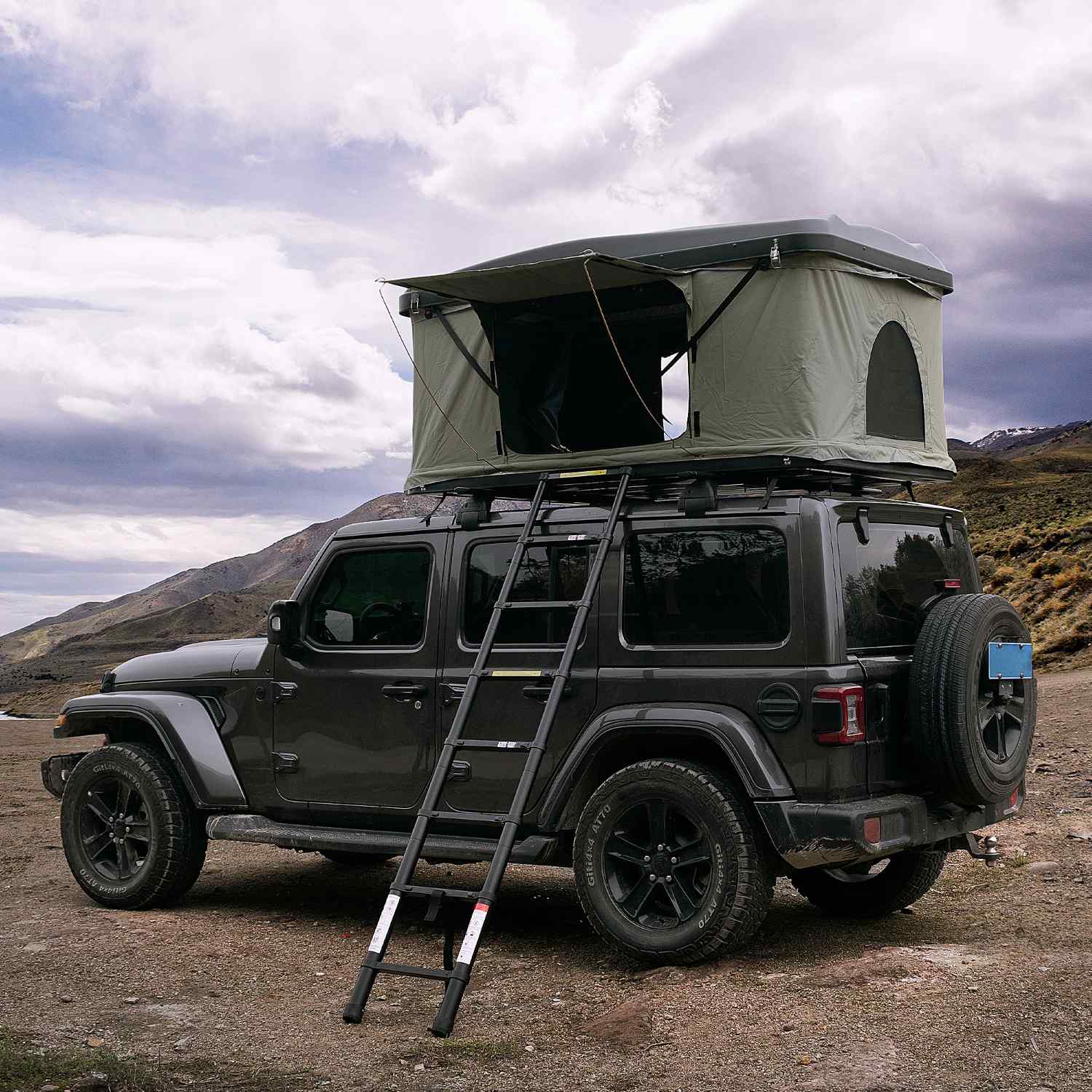 Nomad roof top tent on jeep in mountains