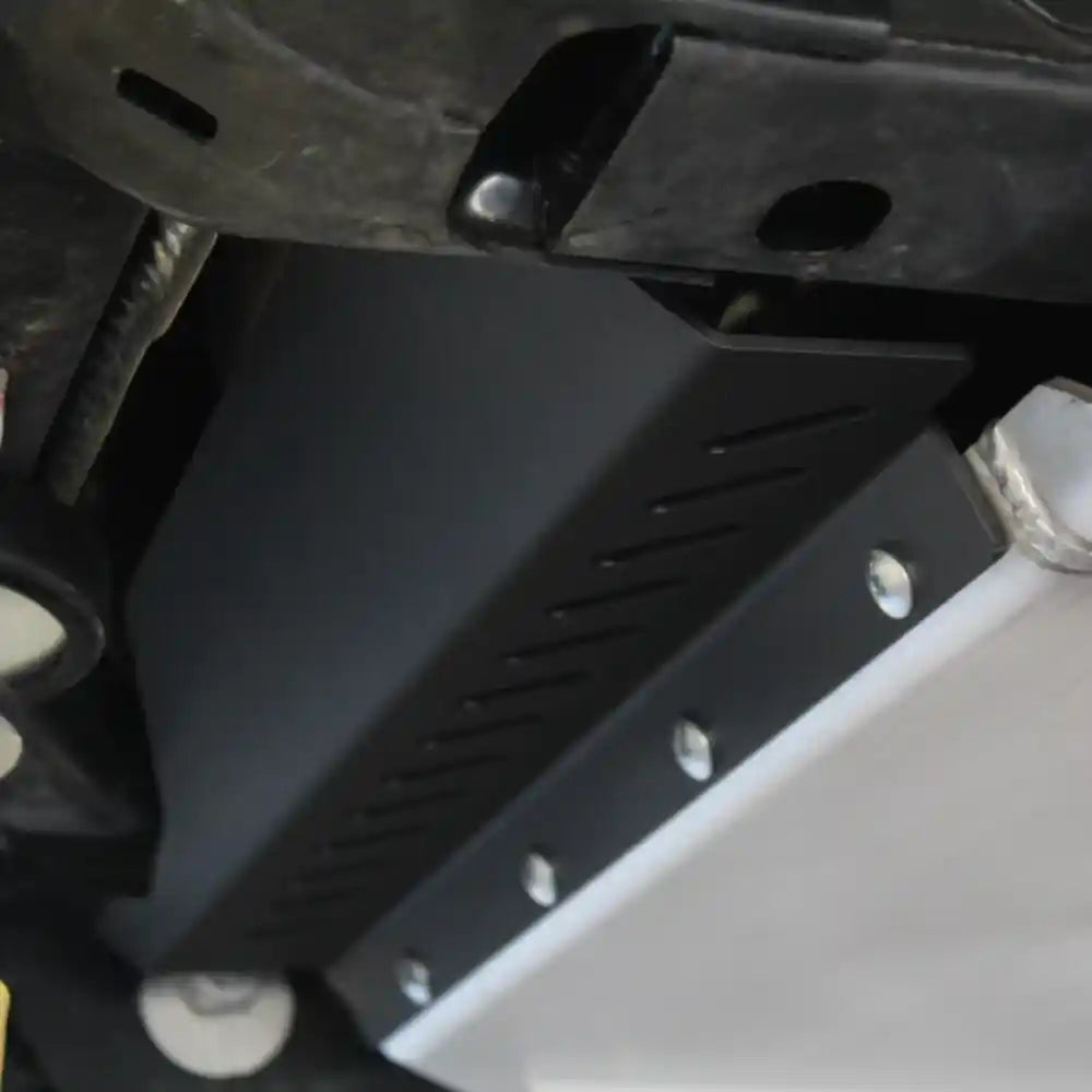 Under-vehicle shot of RCI cat guard protecting exhaust system