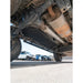 Underbody view of installed black RCI fuel tank skid plate on Colorado near rear axle