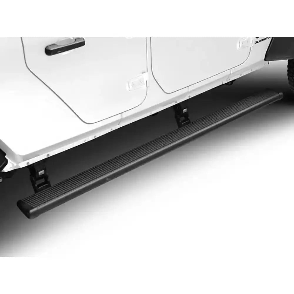 White Jeep Gladiator with black AMP Research PowerStep deployed on driver side
