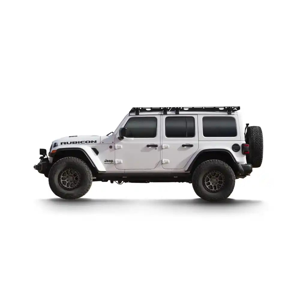 White Jeep Wrangler Rubicon with Starlight roof rack on a white background