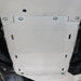 White RCI transmission skid plate bolted under Bronco chassis midsection