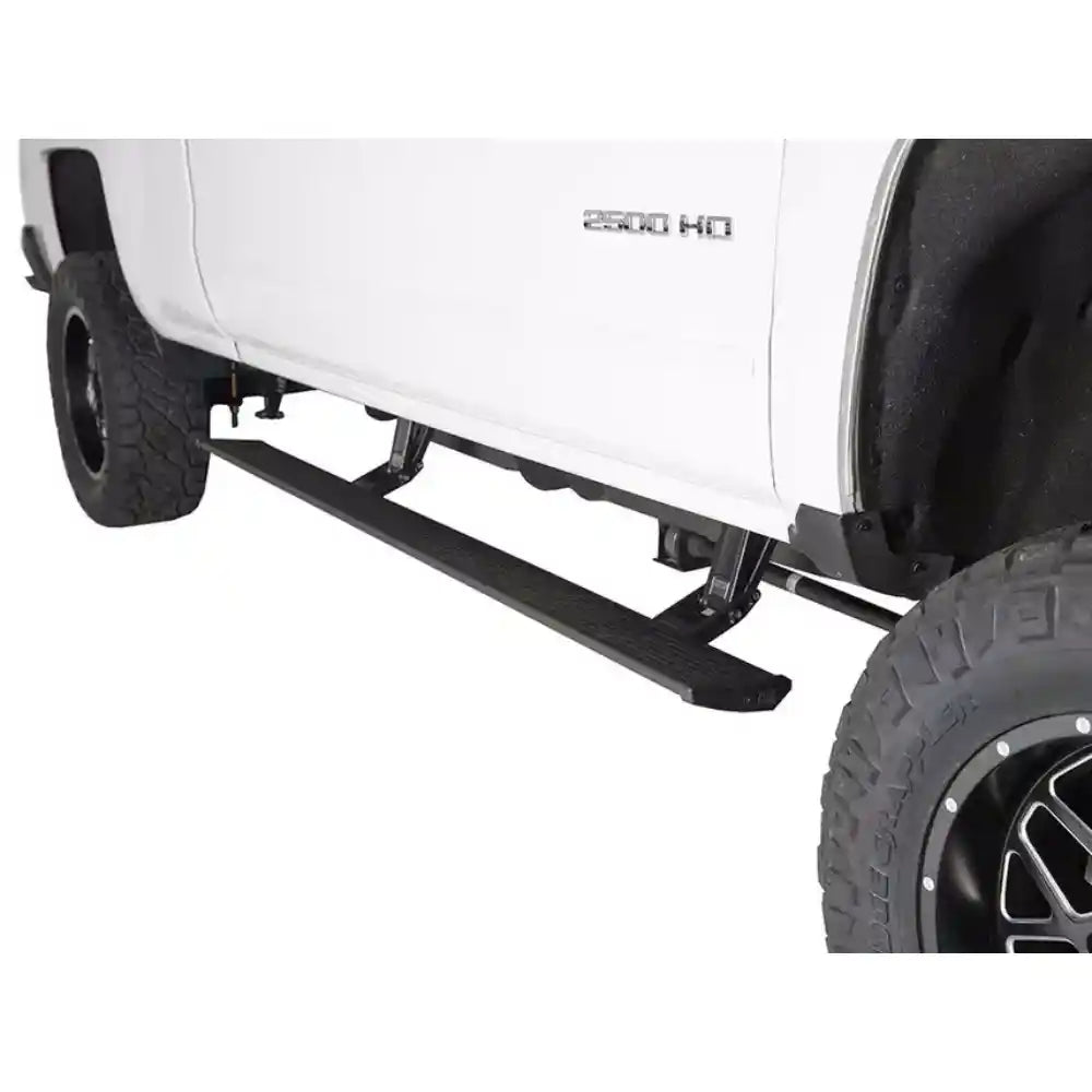 White Silverado HD with AMP PowerStep running boards