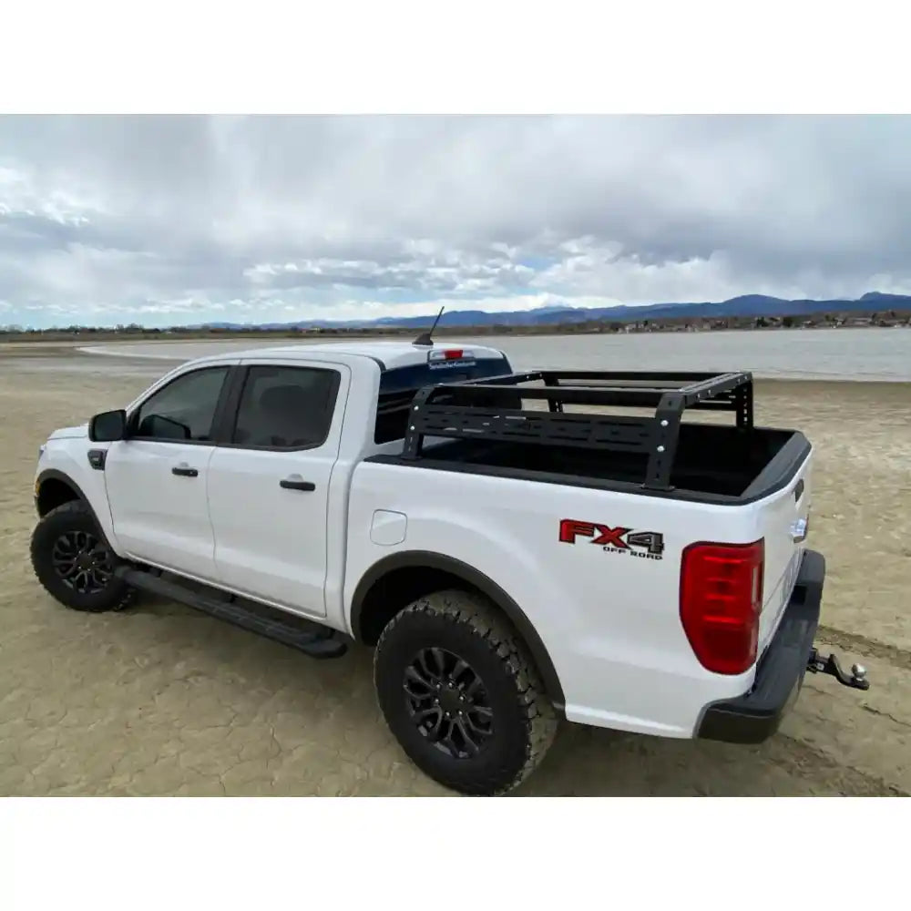 White pickup with RCI Sport Bed Rack, front angle