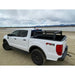 White pickup with RCI Sport Bed Rack, front angle