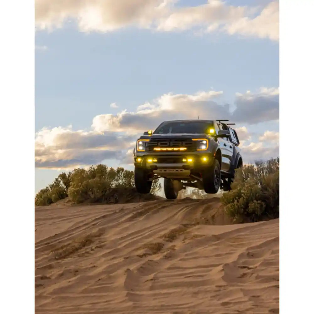 Yellow RCI-protected Ranger climbing rocky dirt path.