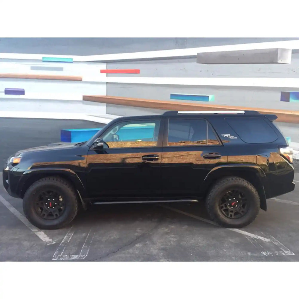 side view of the mounted rsg rock sliders on 4runner