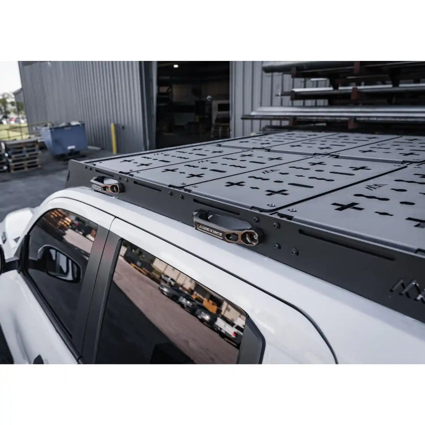 Top-down view of the DRIFTR roof rack showing crossbars and mounting slots
