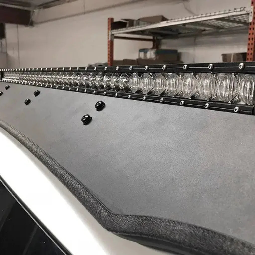 Close-up detail of the bracket and light bar mounting hardware on the Prinsu Roof Rack