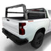 White Silverado with a black TUWA Pro bed rack on a white background