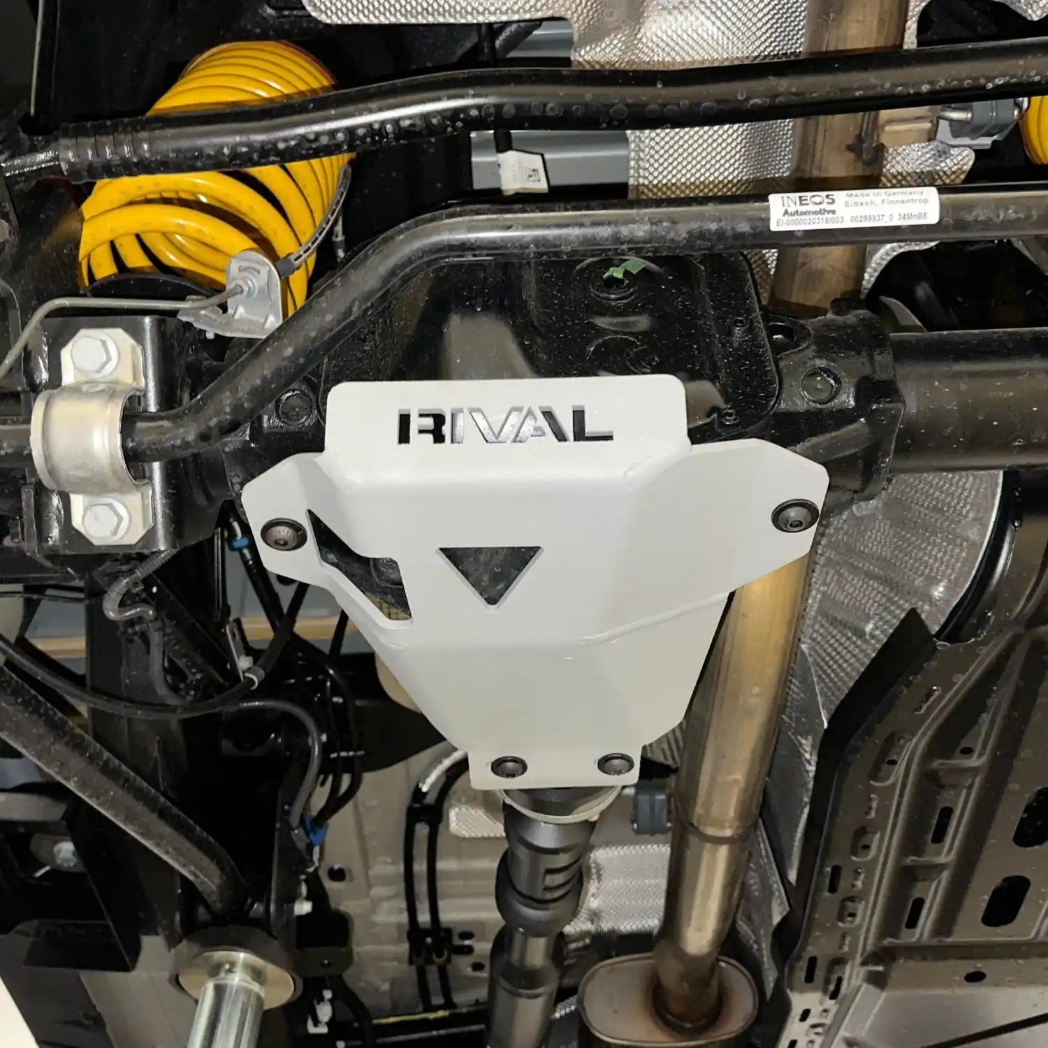 close view of mounted differential skid plate for ineos