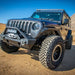 Front view of a black Jeep Wrangler JL 4-Door with the DV8 Offroad Roof Rack installed