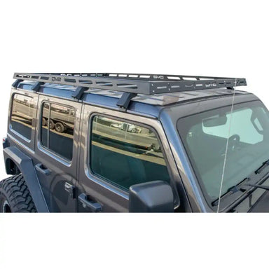 Black DV8 Offroad Roof Rack installed on a dark gray Jeep Wrangler JL 4-Door