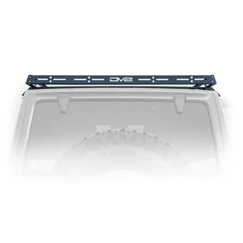 Top-down view of the DV8 Offroad Roof Rack's full-length deck on a white Jeep Wrangler JL 4-Door