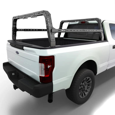 White f-150 with a black bed cover on a white background