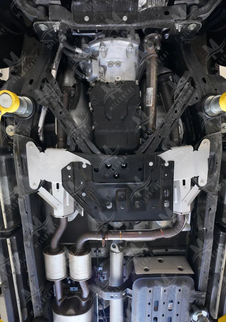 Close-up of a Frontier undercarriage with mechanical components and suspension system.