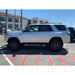 side view of the mounted rock sliders on white 4Runner