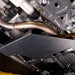 Close-up detail of the Juggernaut transfer case skid plate's aluminum construction and powder-coated finish