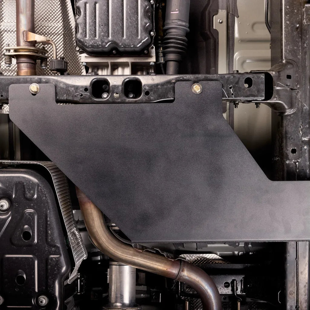 Juggernaut 4Runner transfer case skid plate, standalone product view showing full plate shape and bolt pattern