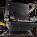 Angled underbody view of a Ford Expedition with the Juggernaut skid plate package installed