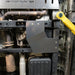 Juggernaut transfer case skid plate installed underneath a Ford Expedition
