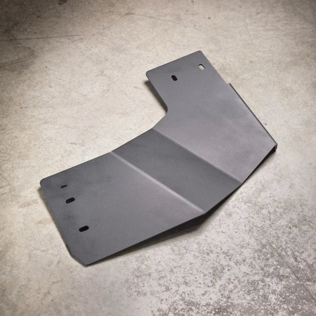 Juggernaut 2009-2014 Ford F-150 transfer case skid plate, second angle showing the powder-coated finish and bolt pattern