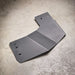 Juggernaut 2009-2014 Ford F-150 transfer case skid plate, second angle showing the powder-coated finish and bolt pattern