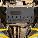Juggernaut transmission skid plate installed near the front differential of a 2009-2014 Ford F-150