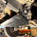 Close-up of the Juggernaut transmission skid plate frame mounting bracket