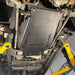 Juggernaut GMC Sierra 2500HD/3500HD transmission skid plate showing the oil drain access panel