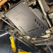 Juggernaut GMC Sierra 2500HD/3500HD transmission skid plate, underside mounting view