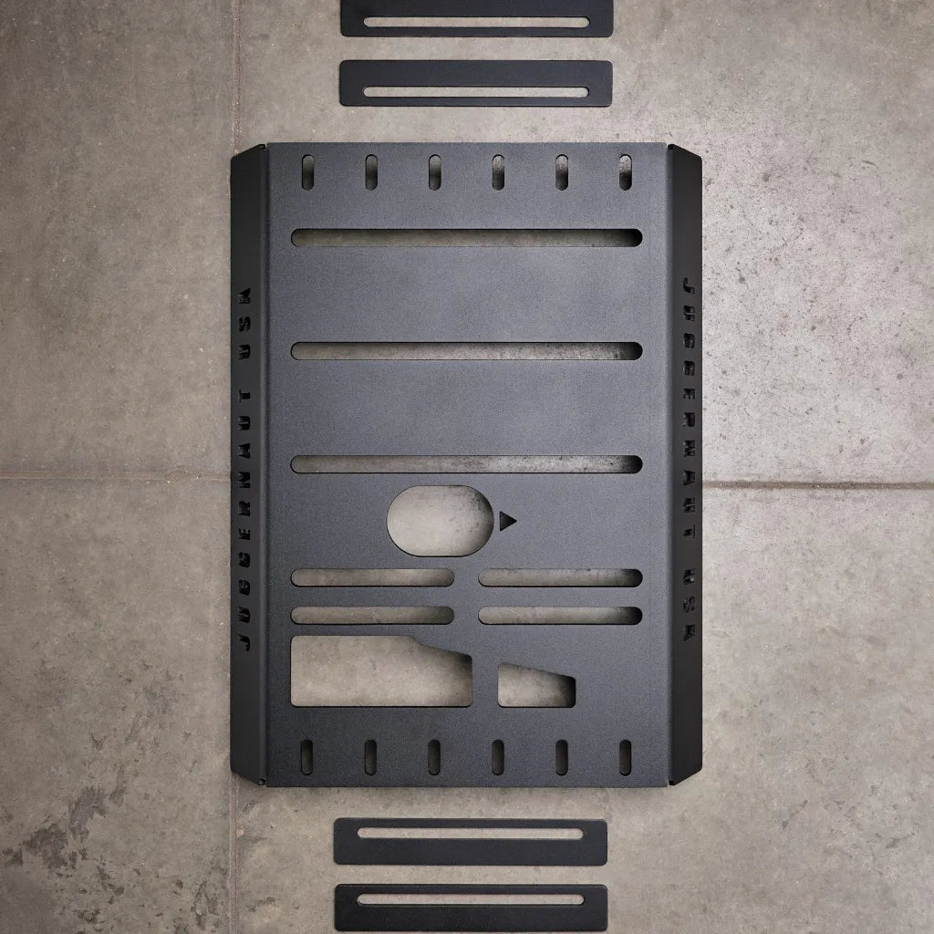 Juggernaut Ram ProMaster generator skid plate installed under the RV