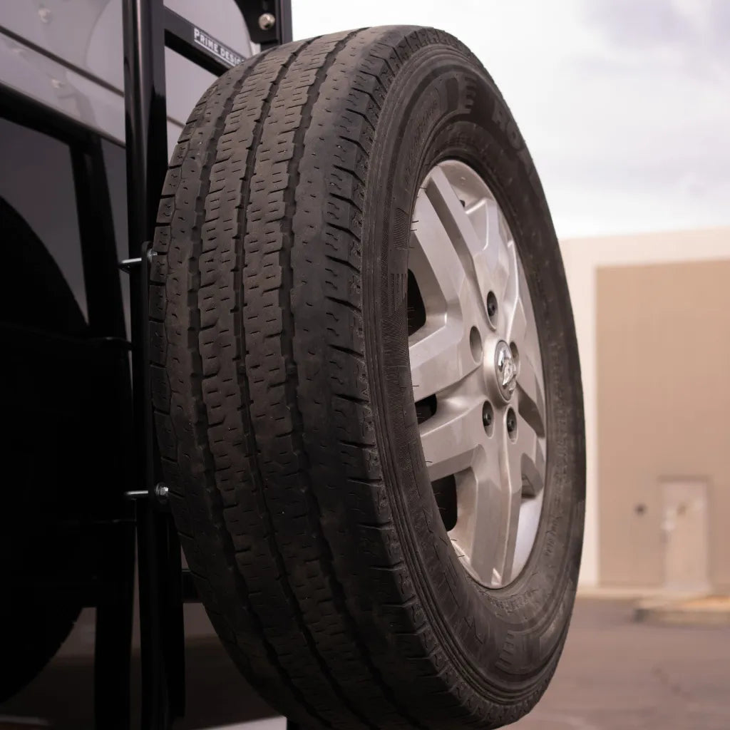 Juggernaut Ram ProMaster rear spare tire rack mounted on rear door